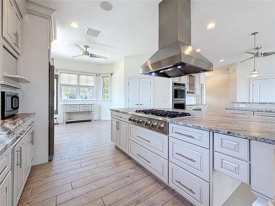 Interior, Kitchen, Pendant Lights, Recessed Lighting, Stainless Steel Appliances, Wood Texture Flooring
