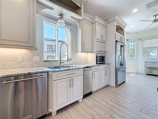 Interior, Kitchen, Pendant Lights, Recessed Lighting, Stainless Steel Appliances, Wood Texture Flooring