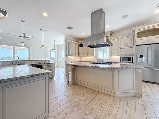 Interior, Kitchen, Pendant Lights, Recessed Lighting, Stainless Steel Appliances, Wood Texture Flooring