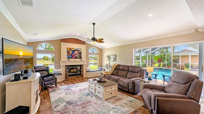Fireplace, Interior, Living room, Recessed Lighting, Wood Texture Flooring