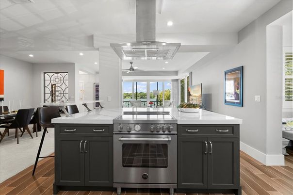 Dining room, Interior, Kitchen, Recessed Lighting, Stainless Steel Appliances, Wood Texture Flooring