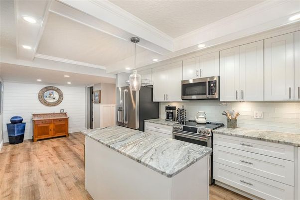 Interior, Kitchen, Pendant Lights, Recessed Lighting, Stainless Steel Appliances, Wood Texture Flooring