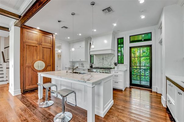 Interior, Kitchen, Marble Walls, Pendant Lights, Recessed Lighting, Wood Texture Flooring