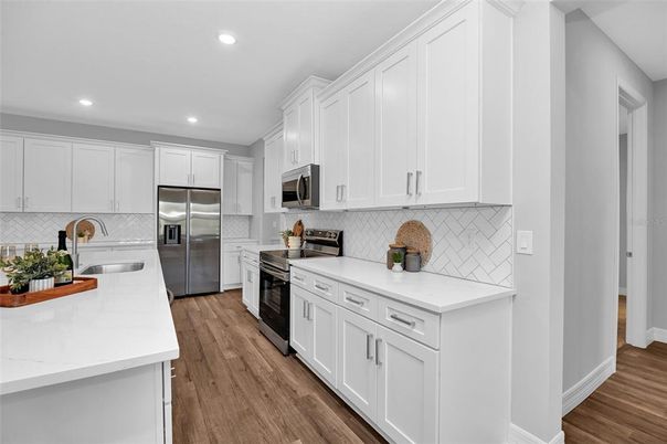 Interior, Kitchen, Recessed Lighting, Stainless Steel Appliances, Wood Texture Flooring