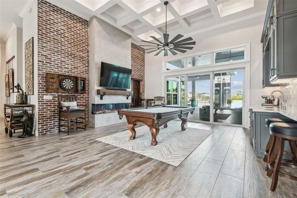 Billiard Table, Fireplace, Game Room, Interior, Stone Walls, Wood Texture Flooring