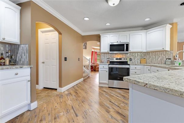 Interior, Kitchen, Recessed Lighting, Stainless Steel Appliances, Wood Texture Flooring