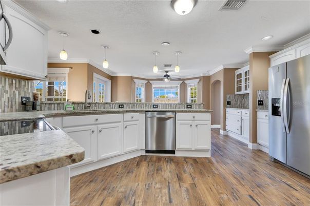Interior, Kitchen, Pendant Lights, Recessed Lighting, Stainless Steel Appliances, Wood Texture Flooring