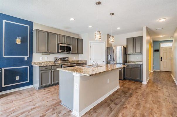 Interior, Kitchen, Pendant Lights, Recessed Lighting, Stainless Steel Appliances, Wood Texture Flooring