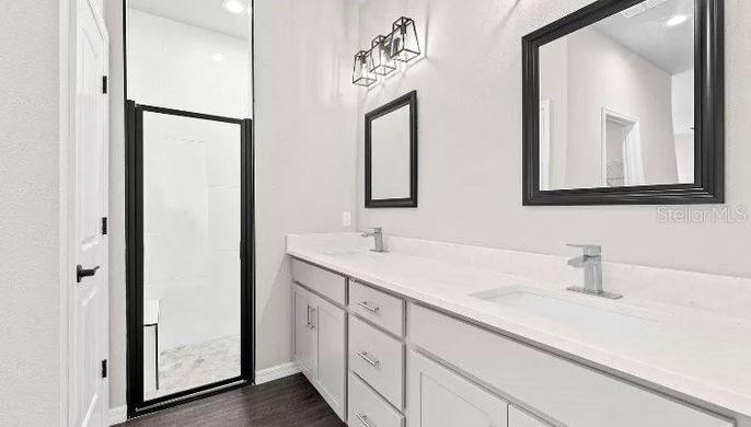 Bathroom, Dual Sink Vanities, Interior, Recessed Lighting, Wood Texture Flooring