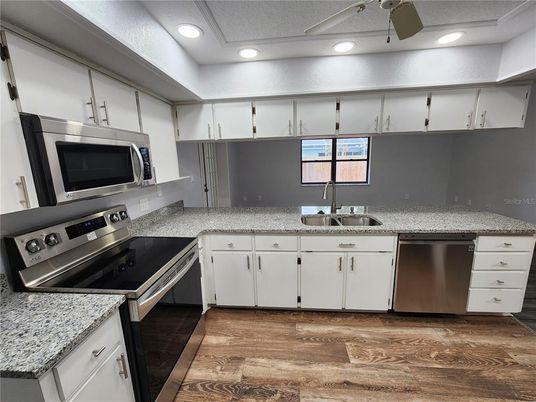 Interior, Kitchen, Recessed Lighting, Stainless Steel Appliances, Wood Texture Flooring