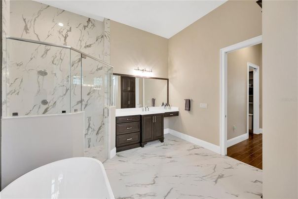 Bathroom, Dual Sink Vanities, Free Standing Baths, Interior, Marble, Marble Walls