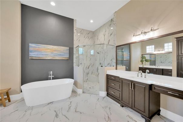 Bathroom, Dual Sink Vanities, Free Standing Baths, Interior, Marble, Marble Walls, Recessed Lighting