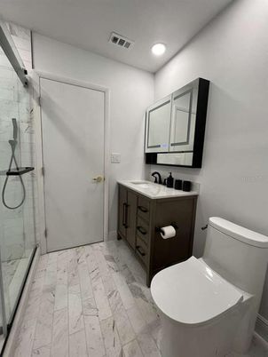 Bathroom, Dual Sink Vanities, Glass Shower, Interior, Marble, Recessed Lighting