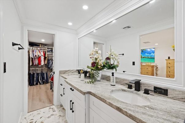 Bathroom, Dual Sink Vanities, Interior, Recessed Lighting, Walk-in Closets, Wood Texture Flooring