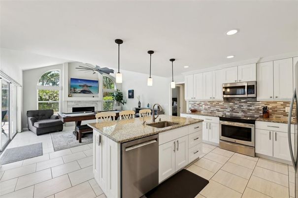 Fireplace, Interior, Kitchen, Living room, Pendant Lights, Recessed Lighting, Stainless Steel Appliances