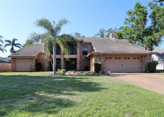 Attached, Backyard, Exterior, Facade, Brick Facade, Ranch