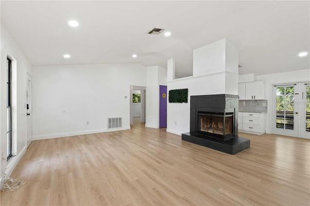 Empty room, Fireplace, Interior, Recessed Lighting, Wood Texture Flooring