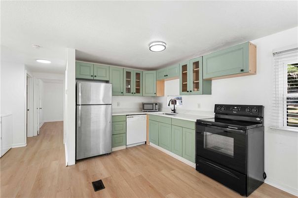 Interior, Kitchen, Recessed Lighting, Stainless Steel Appliances, Wood Texture Flooring