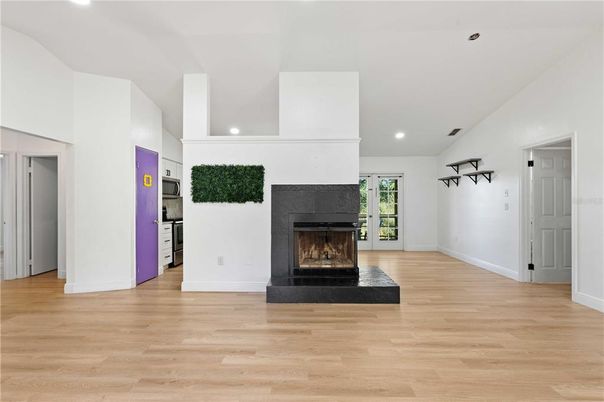 Empty room, Fireplace, Interior, Recessed Lighting, Wood Texture Flooring