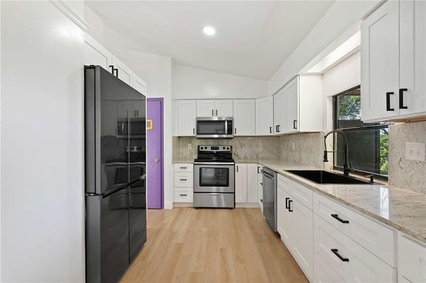 Interior, Kitchen, Recessed Lighting, Stainless Steel Appliances, Wood Texture Flooring