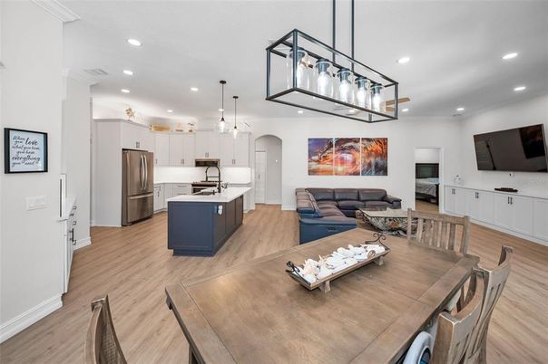Dining room, Interior, Kitchen, Living room, Pendant Lights, Recessed Lighting, Stainless Steel Appliances, Wood Texture Flooring