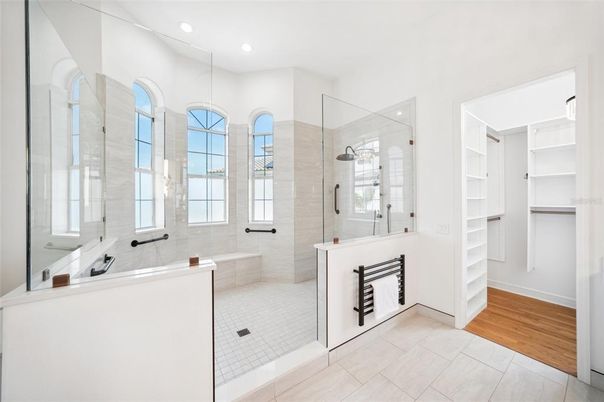 Bathroom, Dual Sink Vanities, Glass Shower, Interior, Recessed Lighting, Wood Texture Flooring