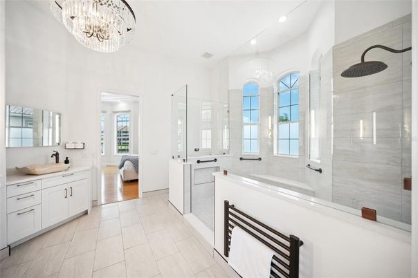 Bathroom, Chandelier, Dual Sink Vanities, Glass Shower, Interior, Recessed Lighting, Wood Texture Flooring