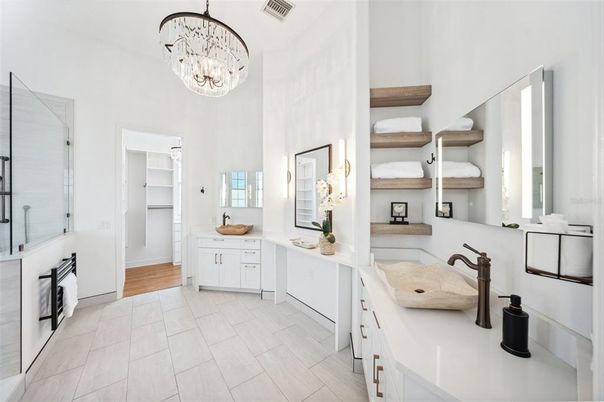 Bathroom, Chandelier, Dual Sink Vanities, Interior, Wood Texture Flooring