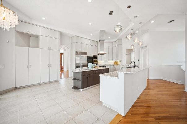 Interior, Kitchen, Pendant Lights, Recessed Lighting, Stainless Steel Appliances, Wood Texture Flooring