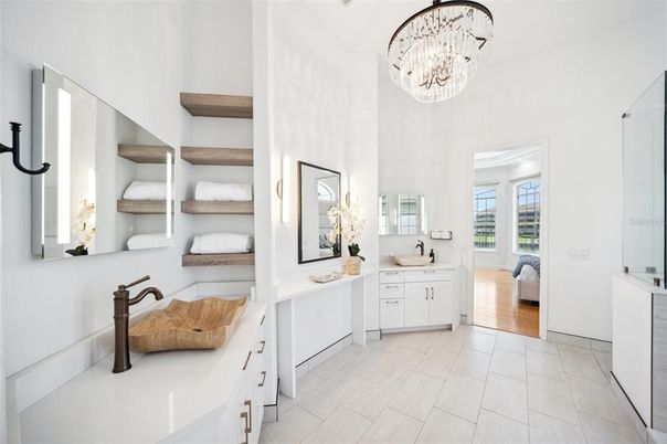 Bathroom, Chandelier, Dual Sink Vanities, Interior, Wood Texture Flooring