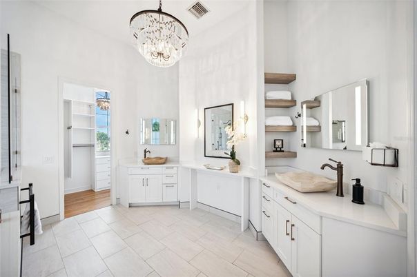 Bathroom, Chandelier, Dual Sink Vanities, Interior, Wood Texture Flooring