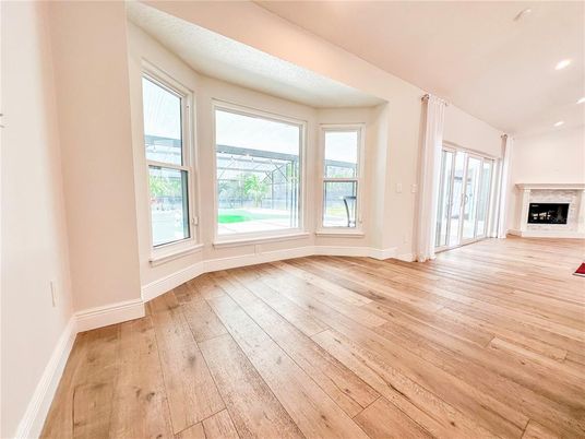 Empty room, Fireplace, Interior, Recessed Lighting, Wood Texture Flooring