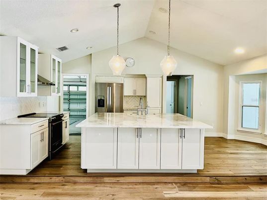 Interior, Kitchen, Pendant Lights, Recessed Lighting, Stainless Steel Appliances, Wood Texture Flooring