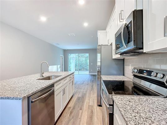Interior, Kitchen, Recessed Lighting, Stainless Steel Appliances, Wood Texture Flooring