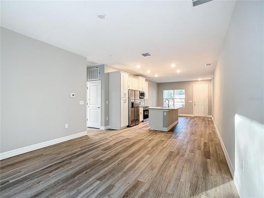 Interior, Kitchen, Recessed Lighting, Stainless Steel Appliances, Wood Texture Flooring