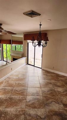 Chandelier, Empty room, Fireplace, Interior