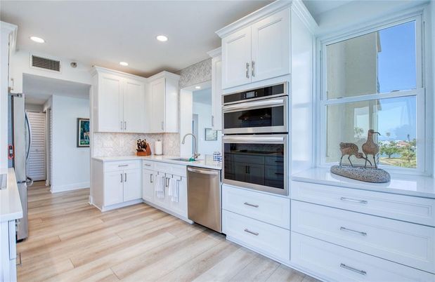 Interior, Kitchen, Recessed Lighting, Stainless Steel Appliances, Wood Texture Flooring