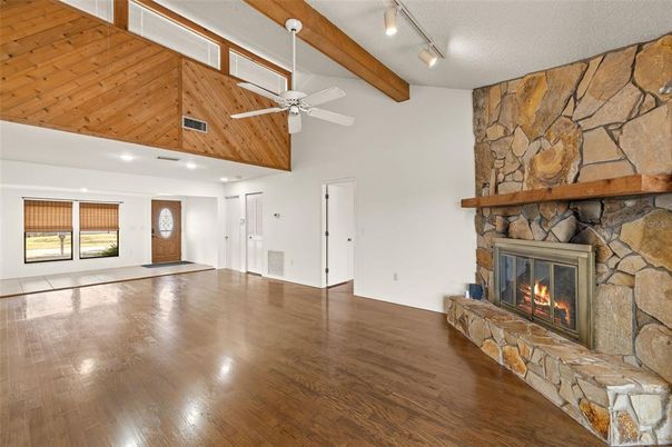 Empty room, Fireplace, Interior, Recessed Lighting, Stone Walls, Wooden Beams, Wooden Ceilings, Wood Texture Flooring