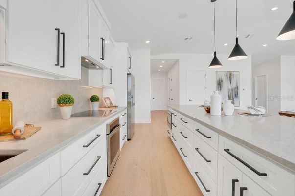 Interior, Kitchen, Pendant Lights, Recessed Lighting, Stainless Steel Appliances, Wood Texture Flooring