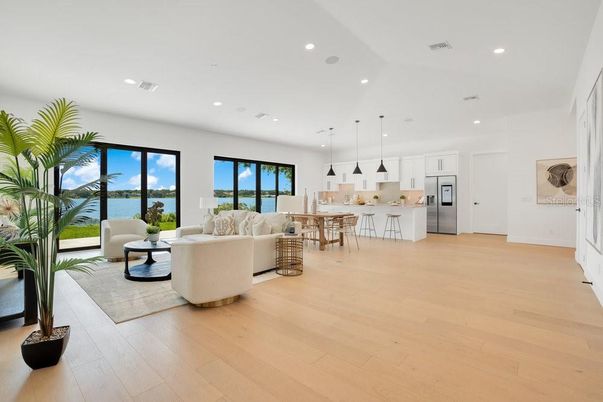 Dining room, Interior, Kitchen, Living room, Pendant Lights, Recessed Lighting, Stainless Steel Appliances, Wood Texture Flooring