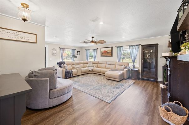 Fireplace, Interior, Living room, Recessed Lighting, Wood Texture Flooring