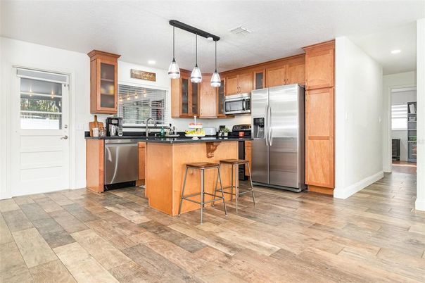 Interior, Kitchen, Pendant Lights, Recessed Lighting, Stainless Steel Appliances, Wood Texture Flooring