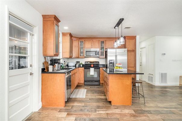 Interior, Kitchen, Pendant Lights, Recessed Lighting, Stainless Steel Appliances, Wood Texture Flooring