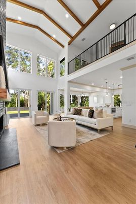 Fireplace, Interior, Living room, Pendant Lights, Recessed Lighting, Wooden Beams, Wood Texture Flooring