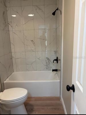 Bathroom, Glass Shower, Interior, Marble Walls, Wood Texture Flooring