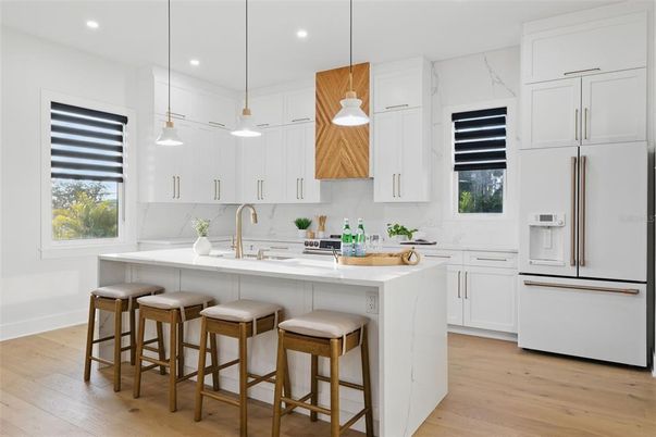 Interior, Kitchen, Marble Walls, Pendant Lights, Recessed Lighting, Wood Texture Flooring
