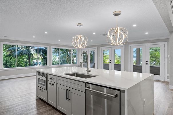 Interior, Kitchen, Pendant Lights, Recessed Lighting, Stainless Steel Appliances, Wood Texture Flooring