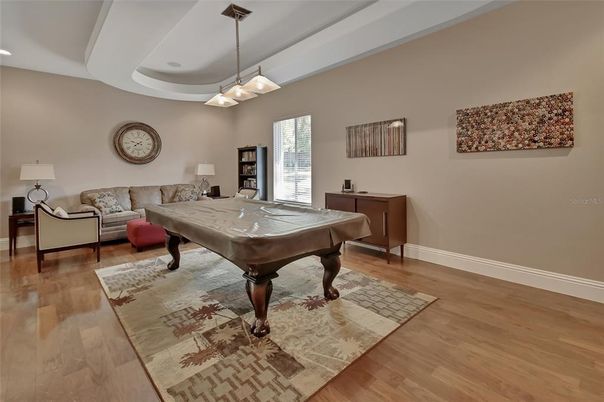 Billiard Table, Game Room, Interior, Living room, Pendant Lights, Recessed Lighting, Wood Texture Flooring