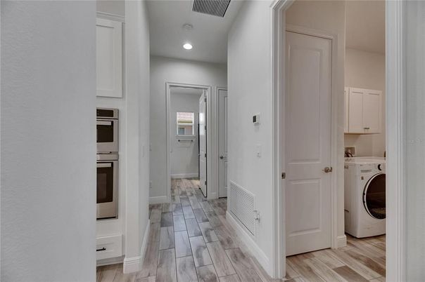 Interior, Recessed Lighting, Utility Closets, Washer, Wood Texture Flooring