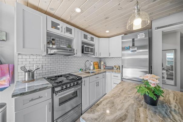 Interior, Kitchen, Pendant Lights, Recessed Lighting, Stainless Steel Appliances, Wooden Ceilings
